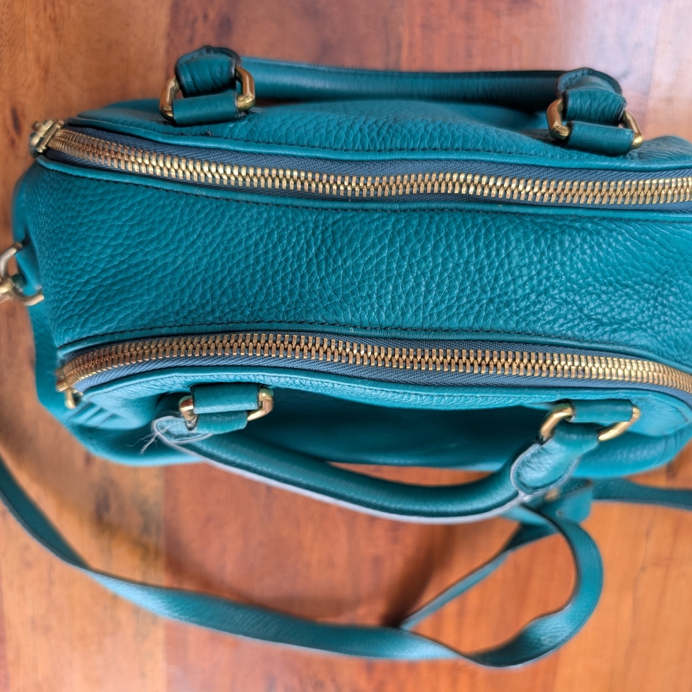 Chic Teal Crossbody Bag with Gold Accents